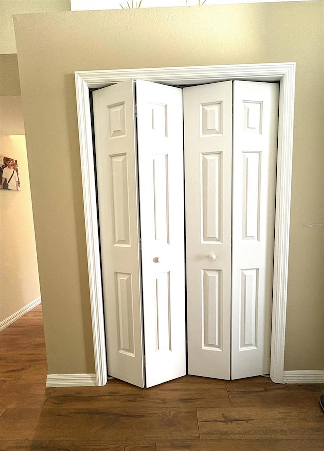 Coat/storage closet in entry way.