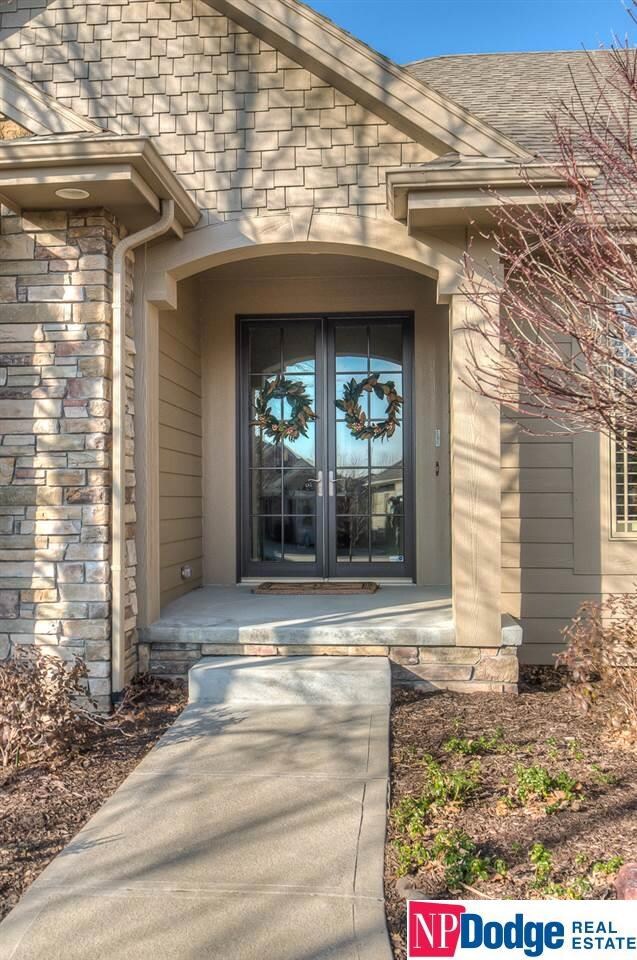 New double French doors give elegance to the home's facade.