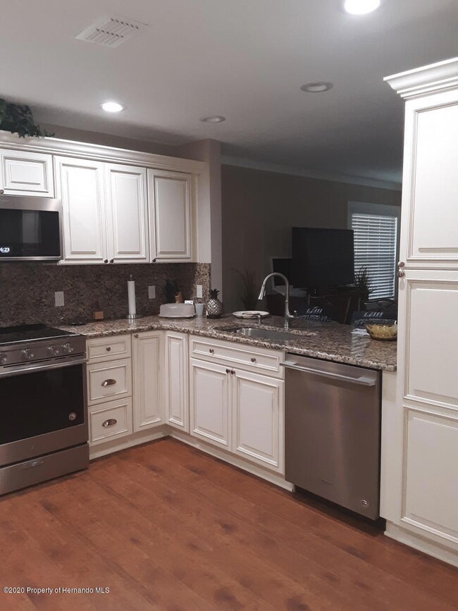 2175 Torrey Pines Ct, Spring Hill, FL 34606 - photo 2