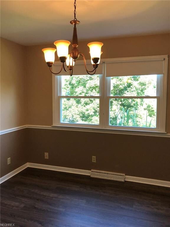 The freshly painted dining room also has new delux
