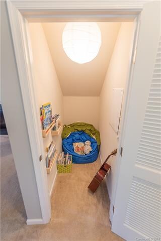 Large storage closet under the stairs that is curr