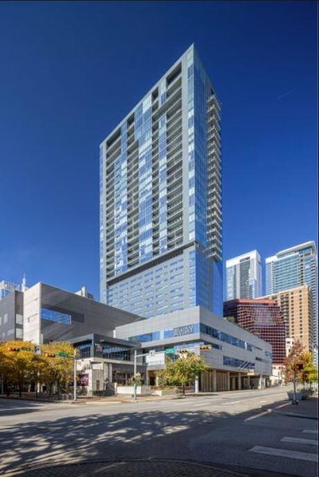 View of building exterior featuring a view of city