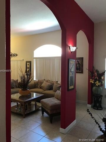 ANOTHER VIEW OF THE LIVING ROOM