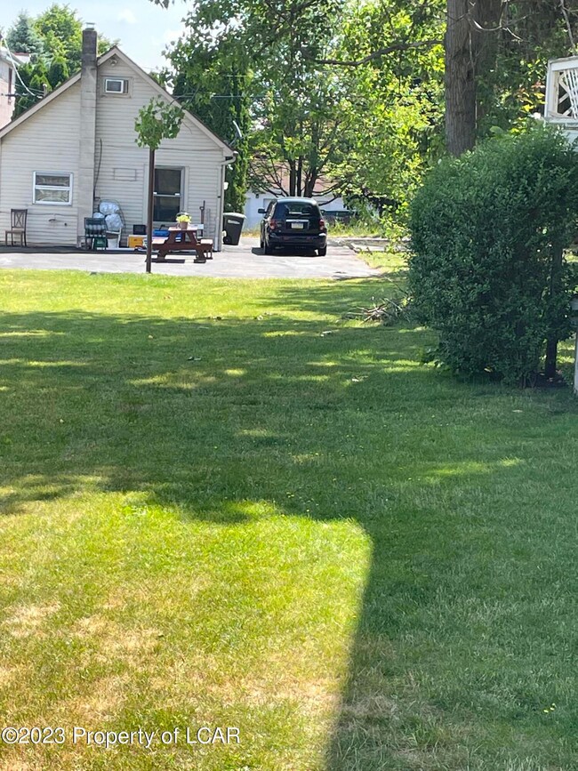 Side Yard to Rear Bungalow