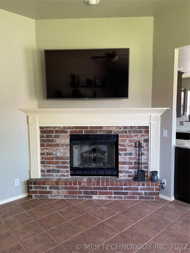 The fireplace has gas logs