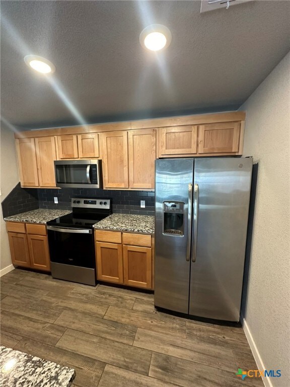 Refrigerator will stay with the unit.