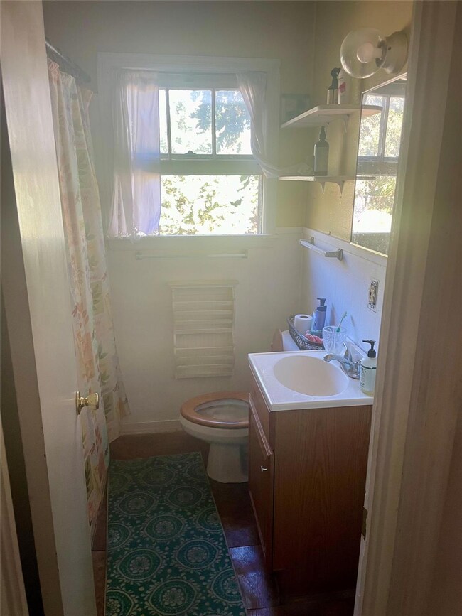 Bathroom with vanity and toilet