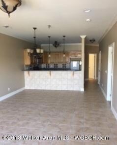 living area into kitchen