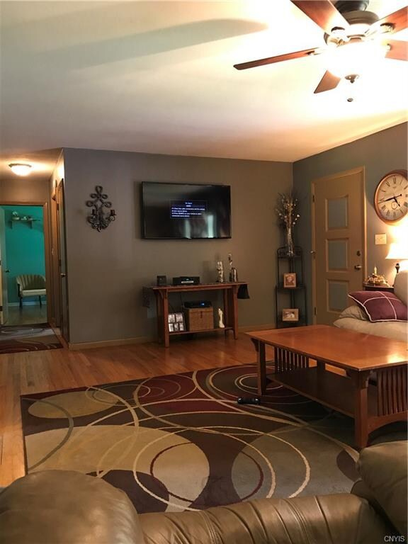Living room, the door to right goes to the open fr
