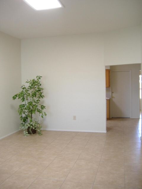 LIVING ROOM WITH SKYLIGHT