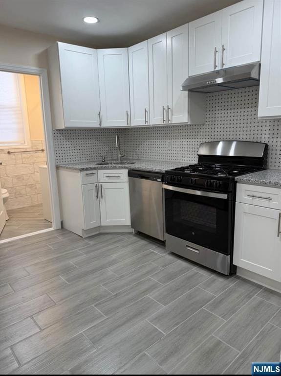 Updated kitchen laundry is to the left side