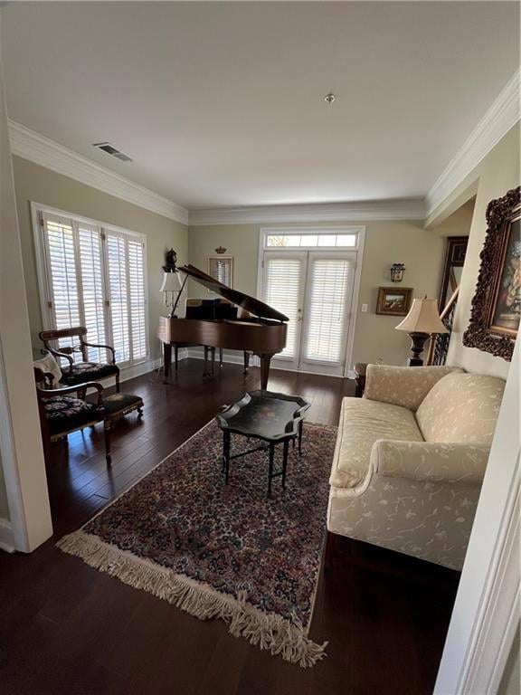 Living room with baby grand piano, french doors to
