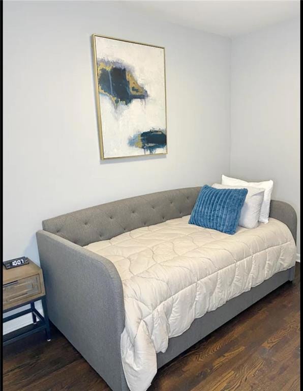 Bedroom featuring wood finished floors