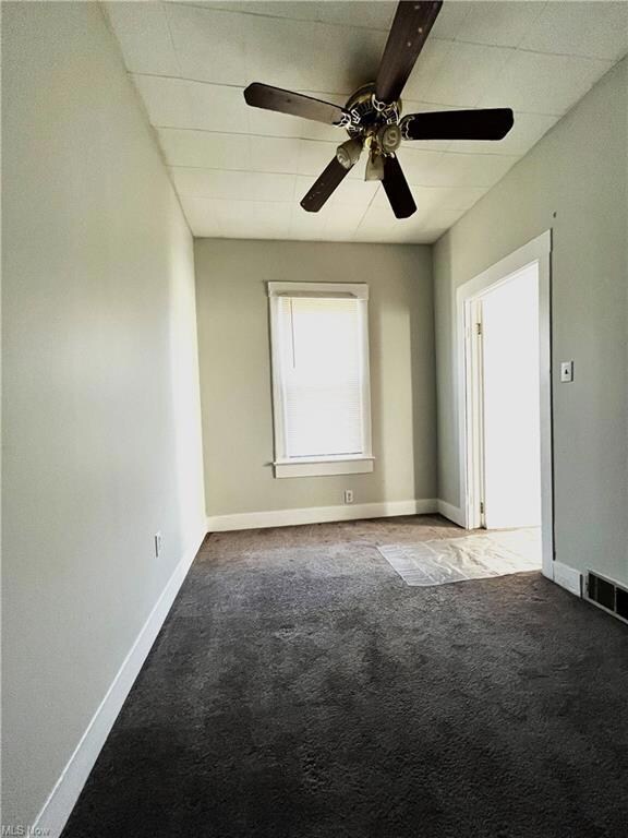 Downstairs freshly painted front bedroom.