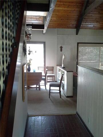 Entry way leads to family room and kitchen area