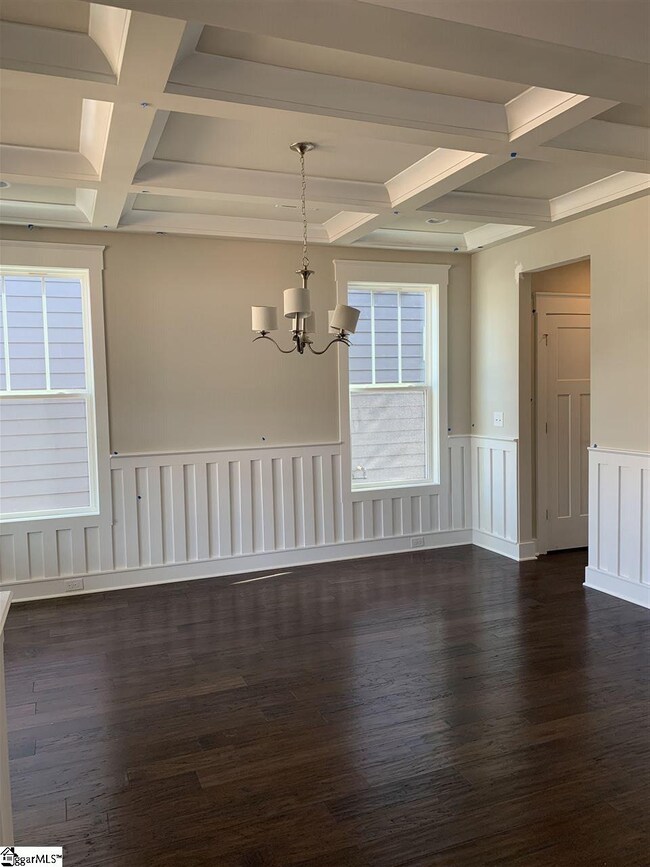 Dining offers hardwood flooring, real wood wainsco