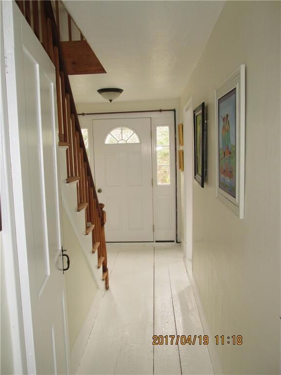 Hallway from kitchen to front of...