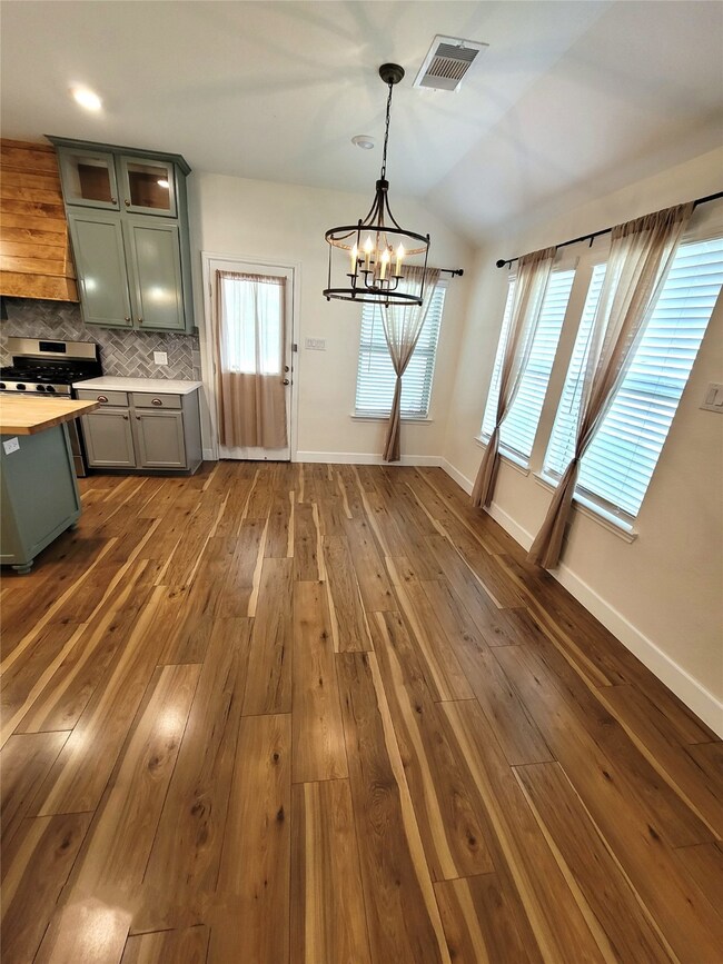 One of the other features is the it has a large open eating area next to the kitchen and family room