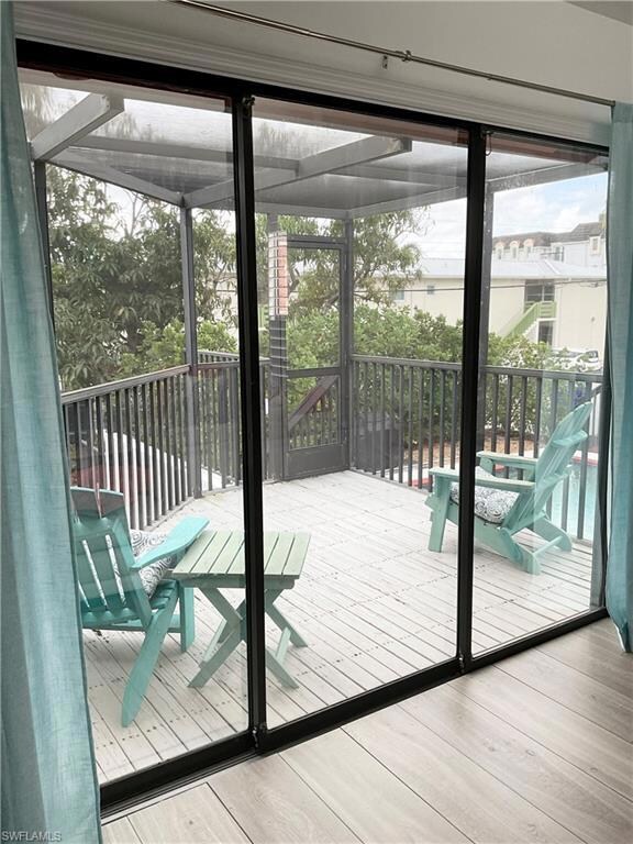 Screened-in balcony overlooks the pool