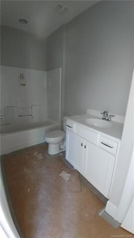 Guest suite bathroom. The other 2 bathrooms are si