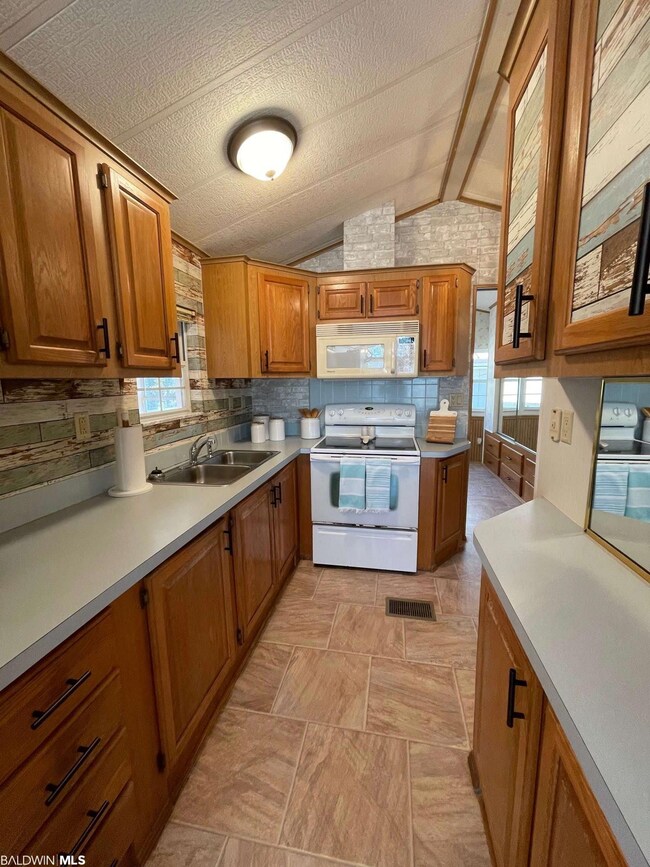 Side by side refrigerator included.