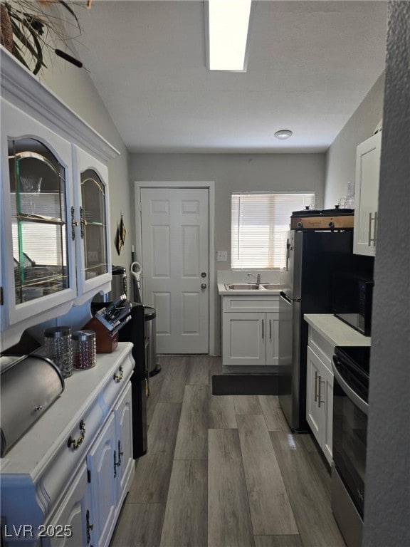 Kitchen featuring stainless steel electric stove,