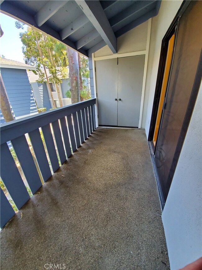 Outside patio deck with Storage area for washer and dryer hookups