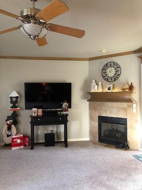Living room with gas log fireplace & mantel