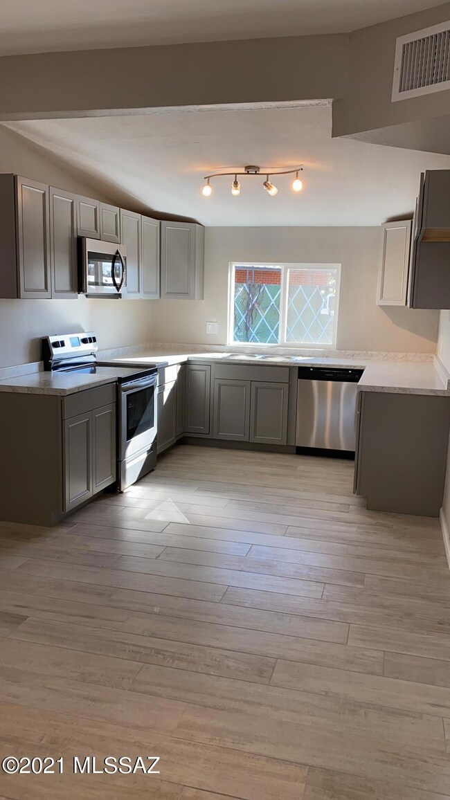 Kitchen with stainless steel appliances