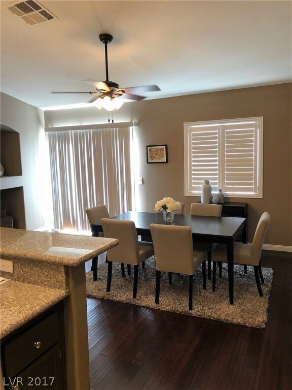 DINING ROOM VIEWED FROM THE KITCHEN WITH MAN MADE