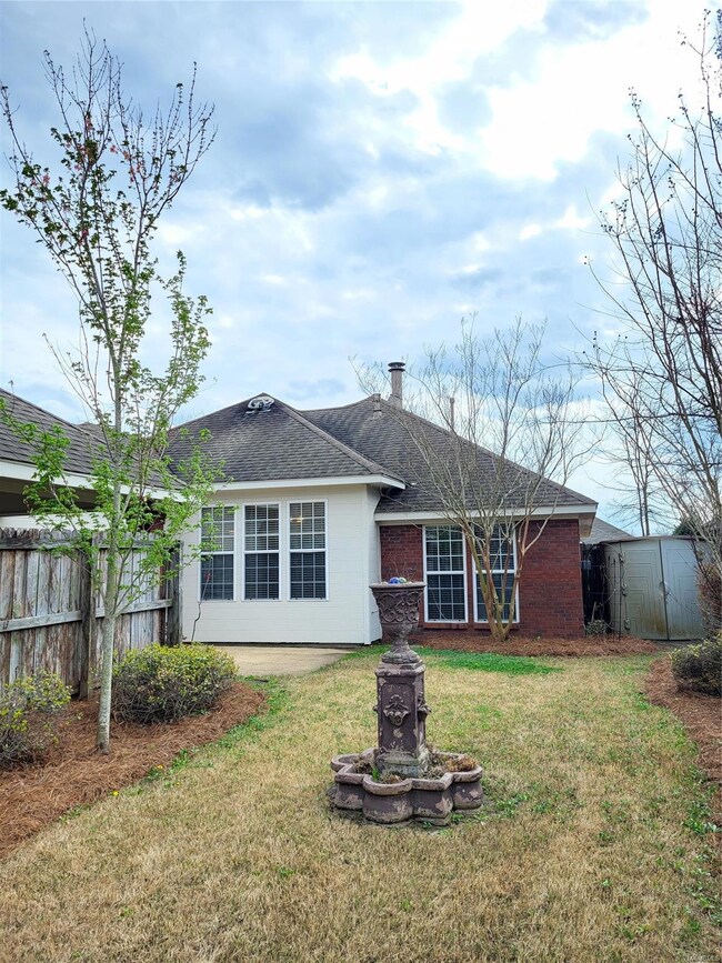 view of back of home from the yard