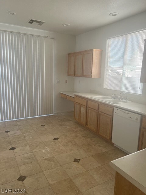 Kitchen with sliding glass door to back yard