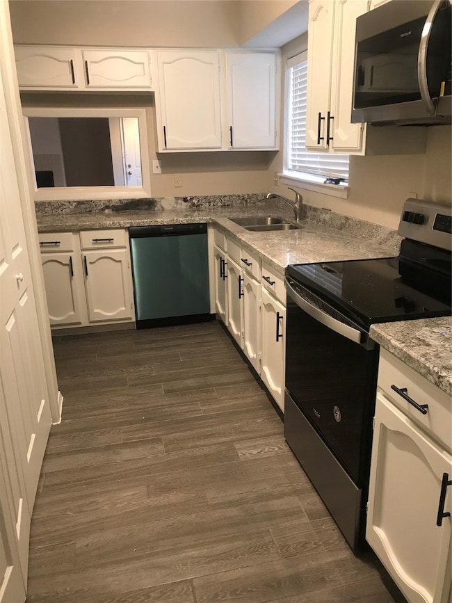 7895 Green Lawn Dr unit 7895, Houston, TX 77088 - photo 7