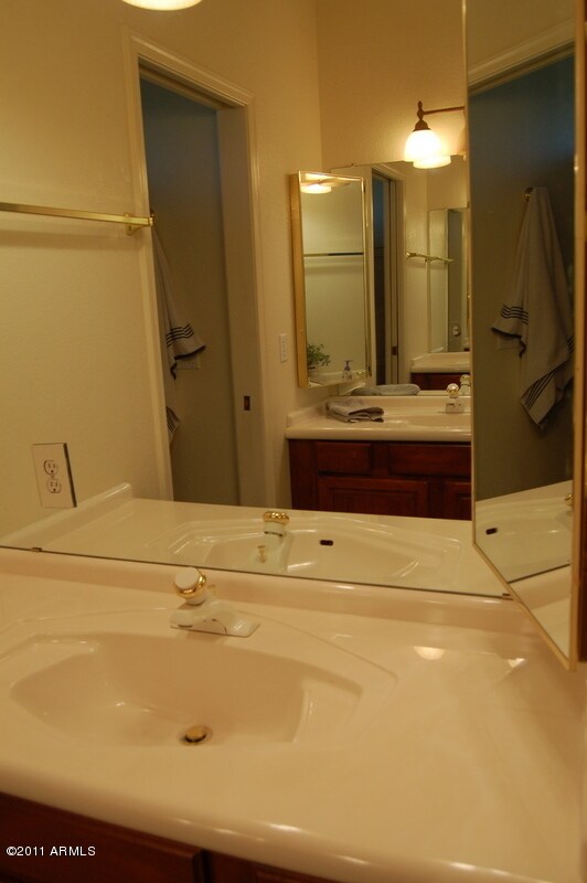 Hall bath has dual sinks