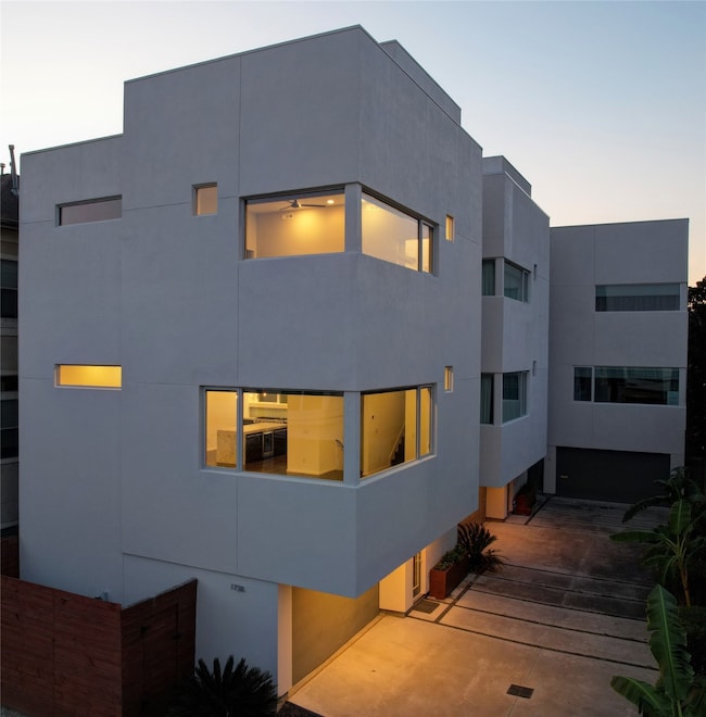 Beautiful city views from second floor living area, third floor primary bedroom, and foruth floor roof top deck.