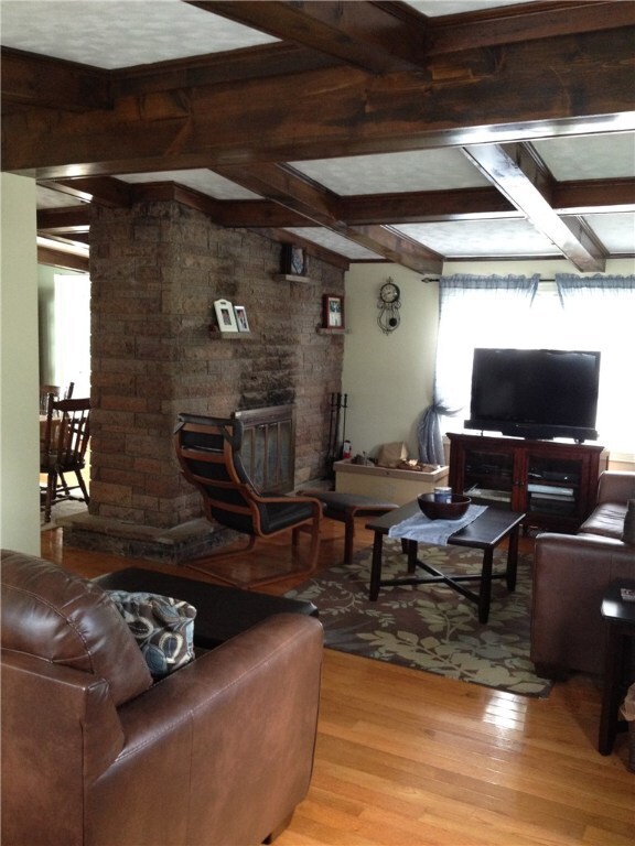 Gorgeous side to side living room with beautiful h