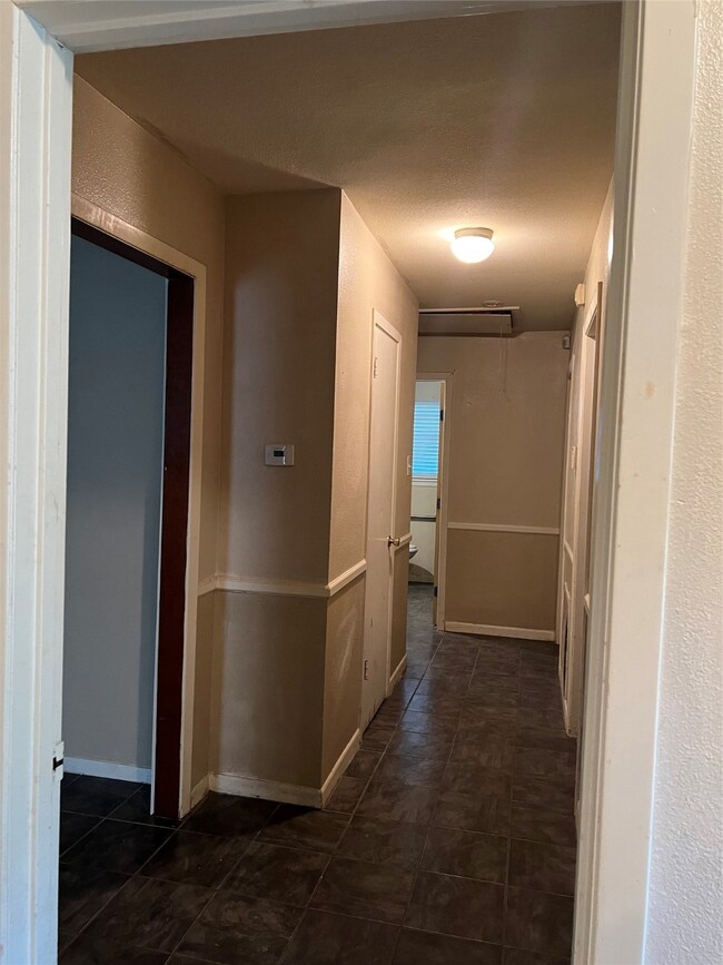 Hallway to family room and bedrooms