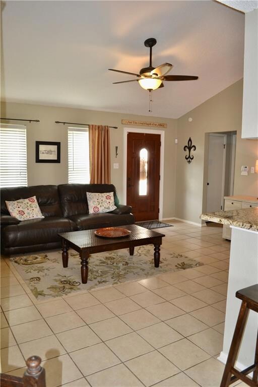 Large living room opens to the kitchen and dining