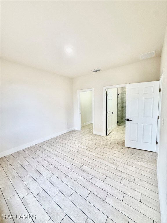 Living room with baseboards, recessed lighting, a
