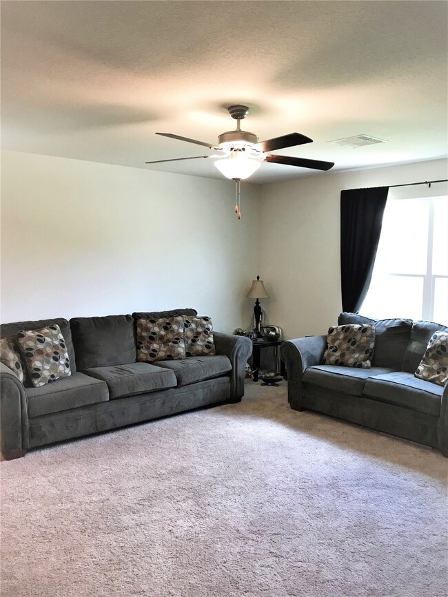 Spacious family room to enjoy and entertain.
