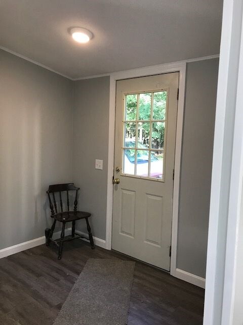 From the drive enter the useful mudroom and laundr
