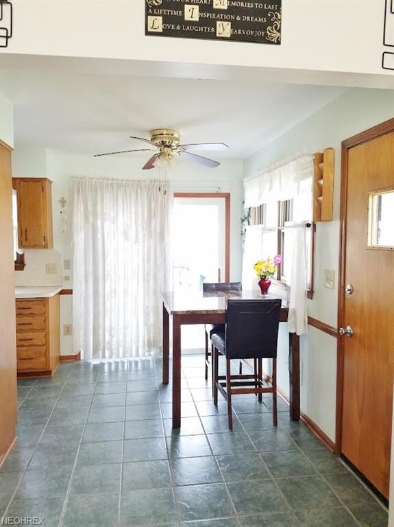 Dining Room with ceramic tile floors leads to pati