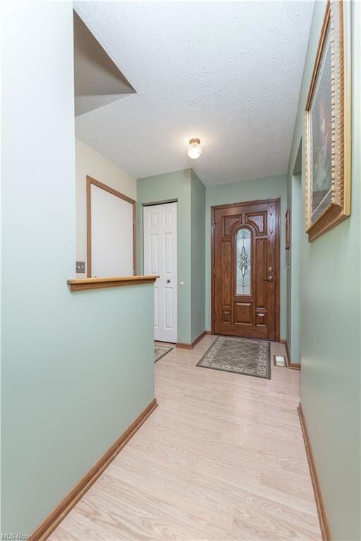 Foyer area with coat closet