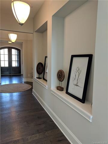 The hallway has specialty lighting that begins in 
