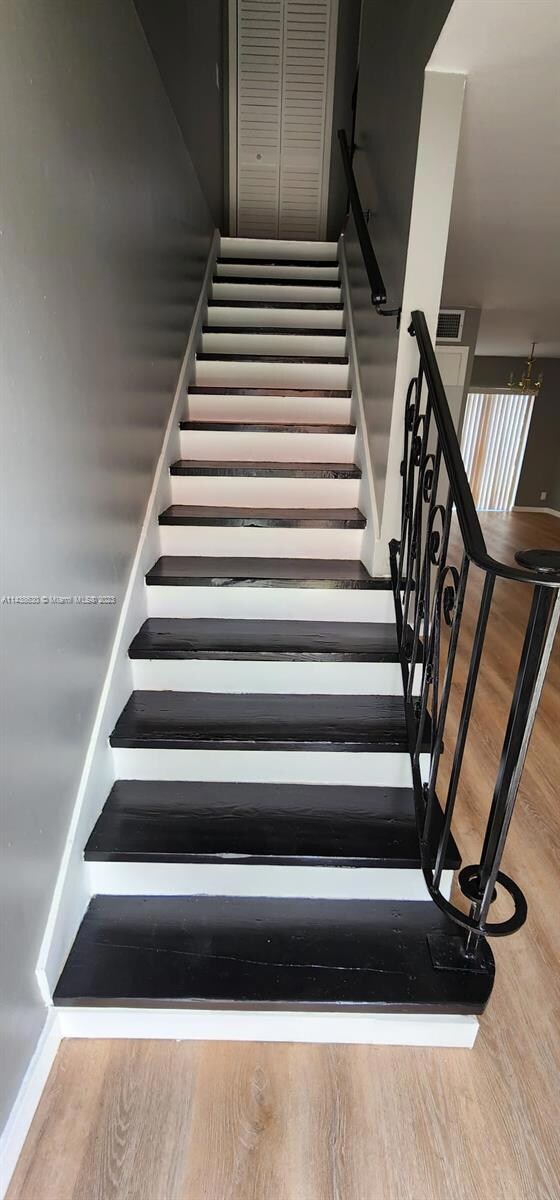 Beautiful stairs leading to the 2 bedrooms.