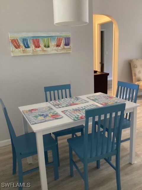 Dining area featuring hardwood / wood-style floors