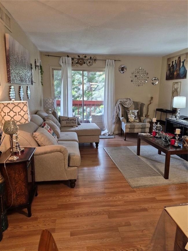 View from dining area, great room, to rear porch