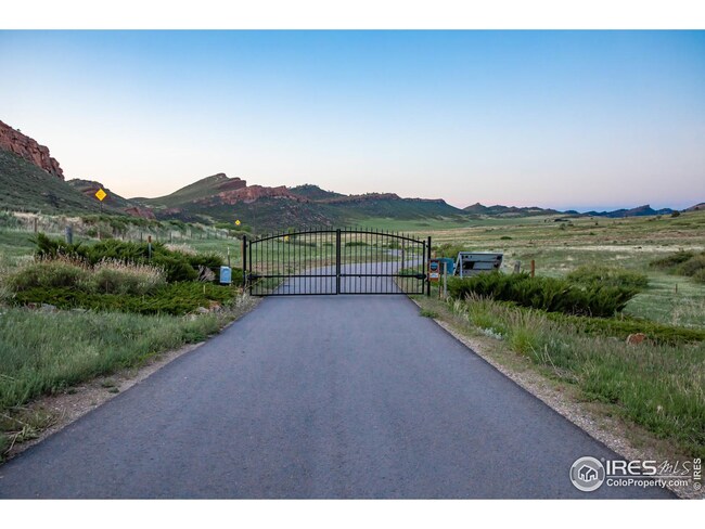 Private gated access with a mile of brand new asphalt driveway!  Enjoy the meandering, scenic drive to the main ranch house.