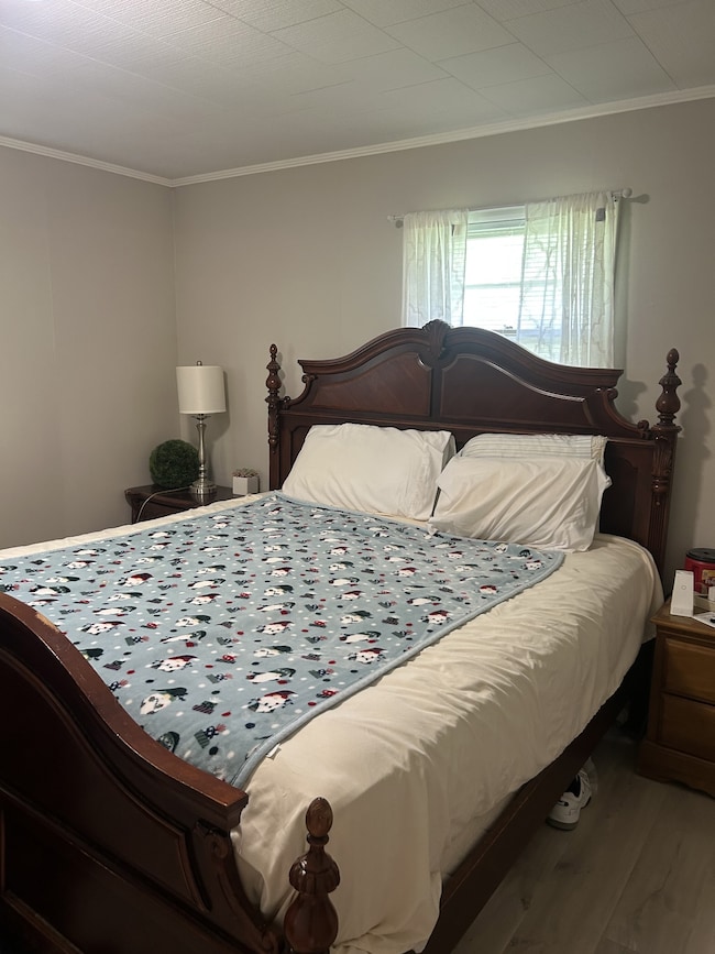 Master bedroom with half bath