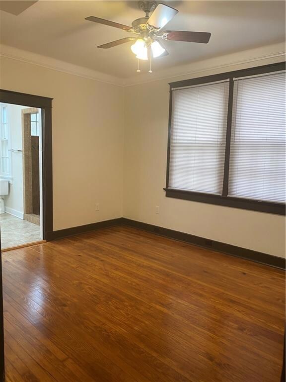 Master bedroom with adjacent bath.